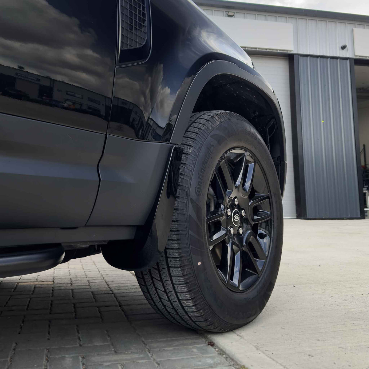 CT CARBON LAND ROVER DEFENDER L663 110 & 90 GLOSS BLACK MUD FLAPS | SWISS HOMOLOGATED