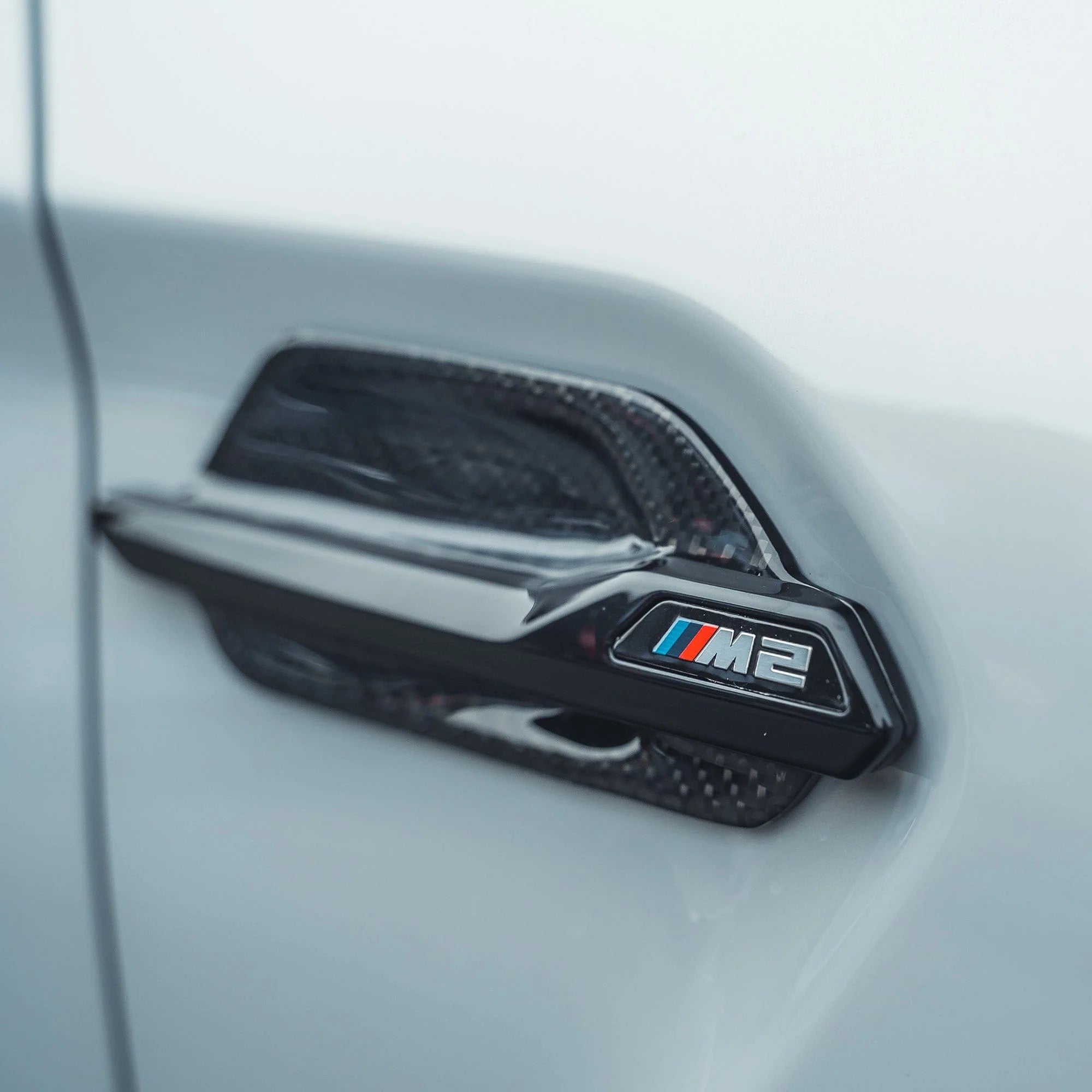 CT CARBON SIDE FENDER VENTS BMW F87 | SWISS HOMOLOGATED